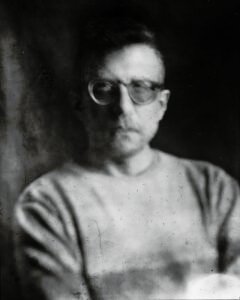 Long-exposure 4×5 portrait exploring layered identity, blurred presence and shifting self. From the series ‘Odrazi’ by Balša Gobović.