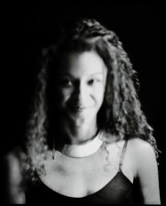 Long-exposure 4×5 portrait exploring layered identity, blurred presence and shifting self. From the series ‘Odrazi’ by Balša Gobović.