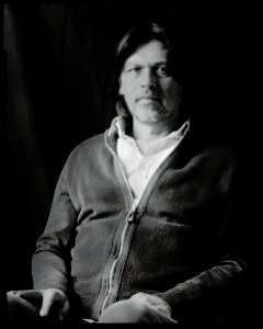 Long-exposure 4×5 portrait exploring layered identity, blurred presence and shifting self. From the series ‘Odrazi’ by Balša Gobović.