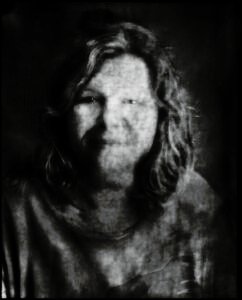 Long-exposure 4×5 portrait exploring layered identity, blurred presence and shifting self. From the series ‘Odrazi’ by Balša Gobović.