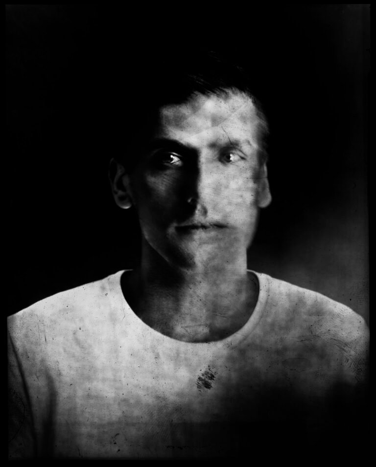 Long-exposure 4×5 portrait exploring layered identity, blurred presence and shifting self. From the series ‘Odrazi’ by Balša Gobović.